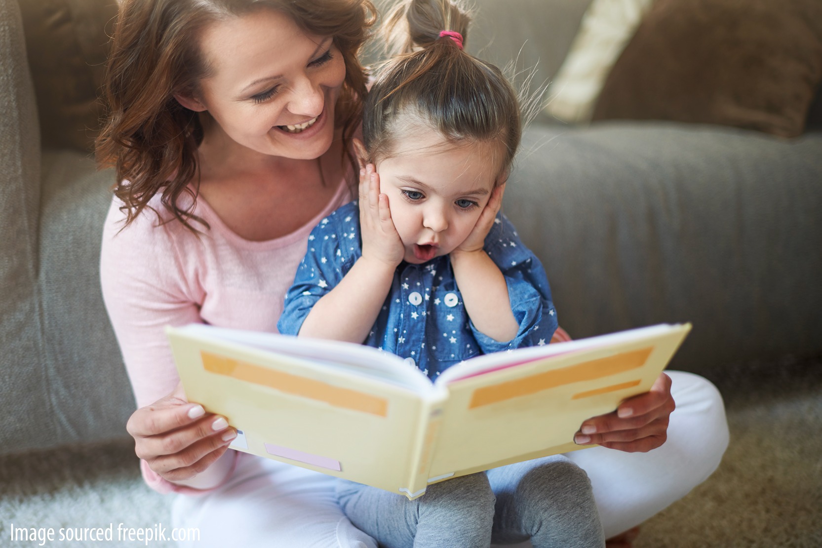 Mother reading to daughter