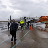 Airport passengers boarding flight